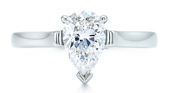Ring with pear shaped diamond